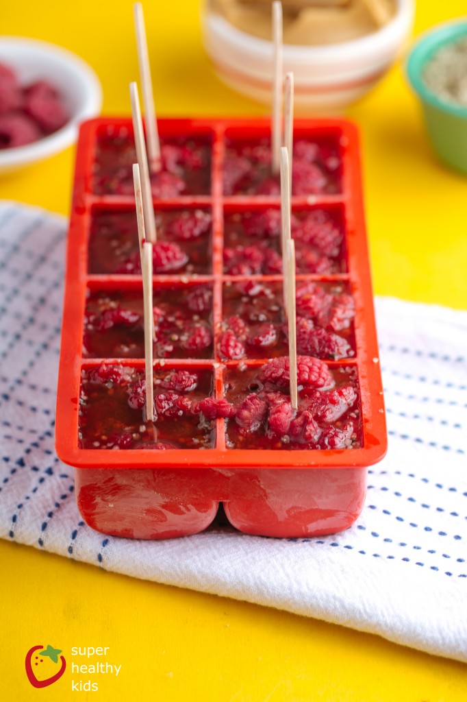 Frozen Peanut Butter Berry Pops Recipe Frozen Peanut Butter Berry Pops. PB & J Popsicles! The tastiest way to enjoy a perfect combination!