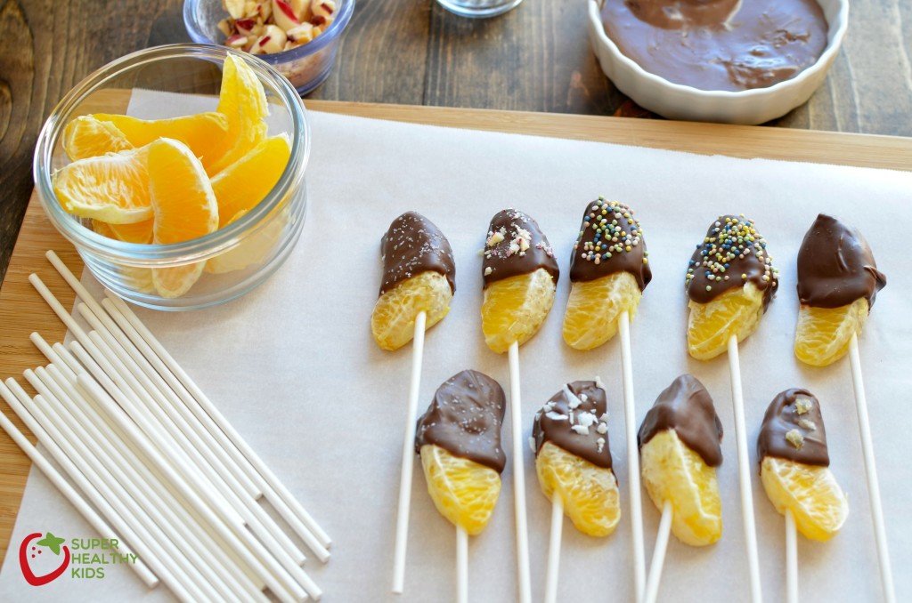 Chocolate Dipped Oranges Chocolate Dipped Oranges! Simple steps to your kids next favorite kitchen activity.