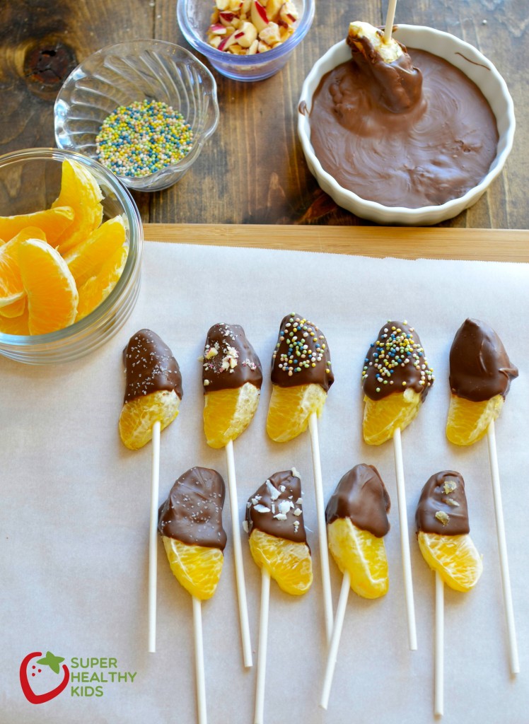 Chocolate Dipped Oranges Chocolate Dipped Oranges! Simple steps to your kids next favorite kitchen activity