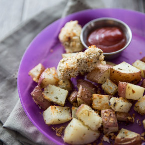 RANCH CRUSTED CHICKEN NUGGETS AND ROASTED POTATOES | This one pan meal is sure to please kids and adults alike. Make with only a few simple ingredients, these are chicken nuggets you can feel good about feeing your children!