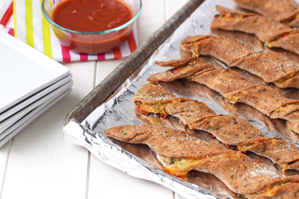 Veggie Stuffed Pizza Twists Veggie Stuffed Pizza Twists - The funnest way to eat vegetables ever! Whole wheat pizza crust stuffed with veggies and cheese and dipped in pizza sauce. Kids will love this healthy dinner!