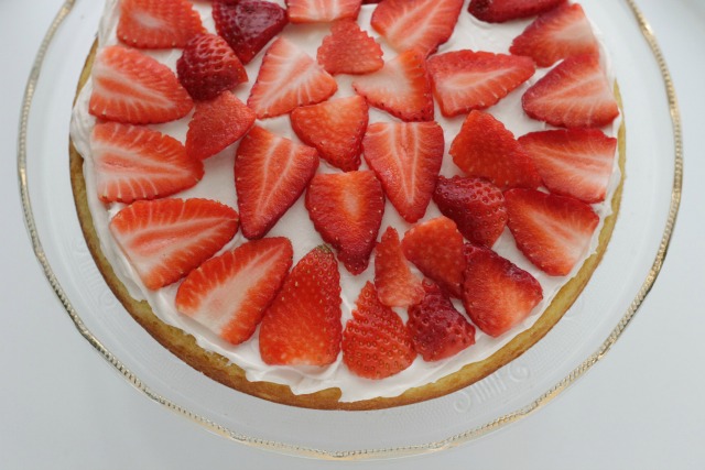 Low sugar lightened up moist vanilla cake with strawberry frosting. www.superhealthykids.com
