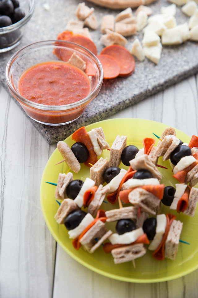 Pizza Kebabs PIZZA KEBABS the easiest snack you're kids are sure to love! Not only are they quick, but they are so simple to put together the kids can make them almost all on their own (with help in the baking of course). Perfect for an after school pick-me-up!