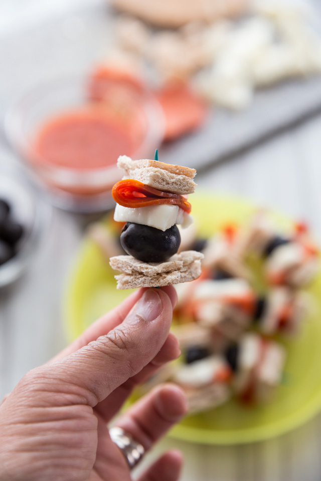 Pizza Kebabs PIZZA KEBABS the easiest snack you're kids are sure to love! Not only are they quick, but they are so simple to put together the kids can make them almost all on their own (with help in the baking of course). Perfect for an after school pick-me-up!