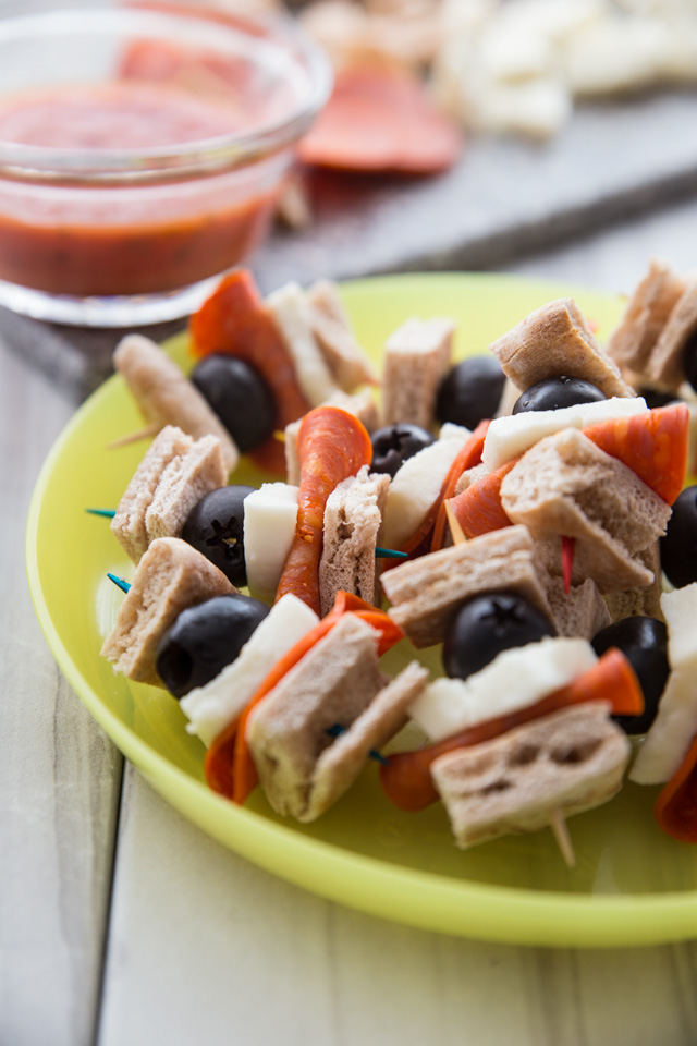 Pizza Kebabs PIZZA KEBABS the easiest snack you're kids are sure to love! Not only are they quick, but they are so simple to put together the kids can make them almost all on their own (with help in the baking of course). Perfect for an after school pick-me-up!