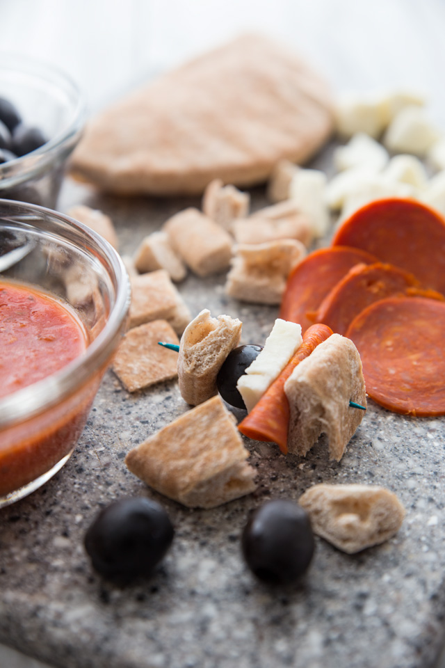 Pizza Kebabs PIZZA KEBABS the easiest snack you're kids are sure to love! Not only are they quick, but they are so simple to put together the kids can make them almost all on their own (with help in the baking of course). Perfect for an after school pick-me-up!