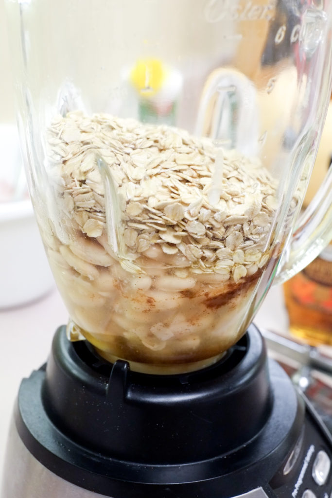 The bean and oat mixture is quickly mixed in a blender.