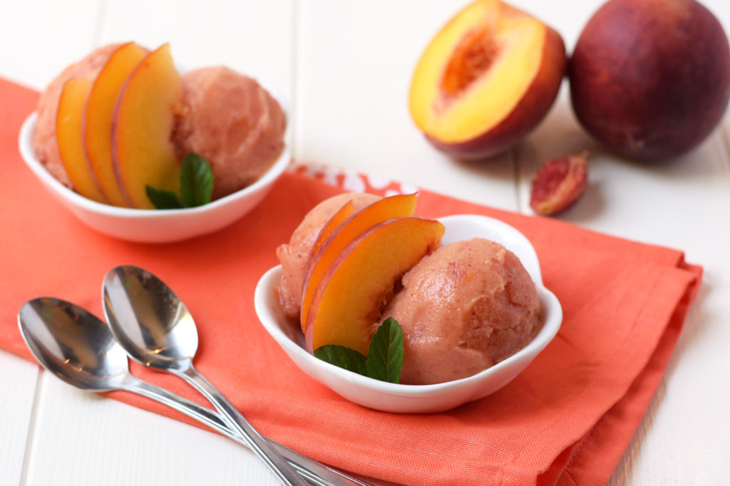 Homemade Peach Sorbet - Only three healthy ingredients and no ice cream maker required for this healthy, fresh dessert! It's the perfect summer treat!