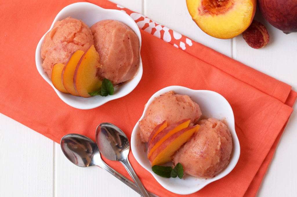 Homemade Peach Sorbet - Only three healthy ingredients and no ice cream maker required for this healthy, fresh dessert! It's the perfect summer treat!
