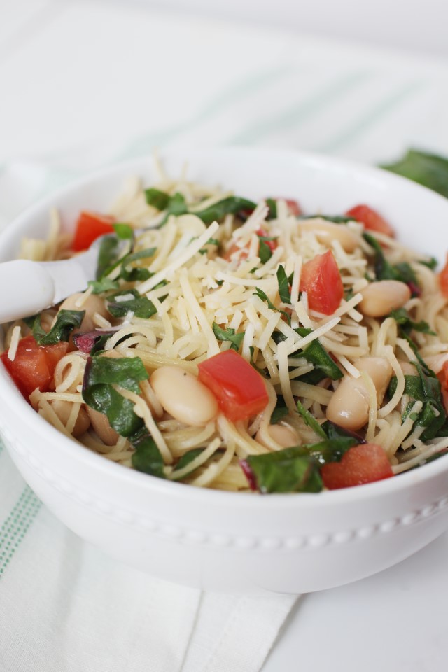 Garlic Pasta with Swiss Chard in a bowl with a fork